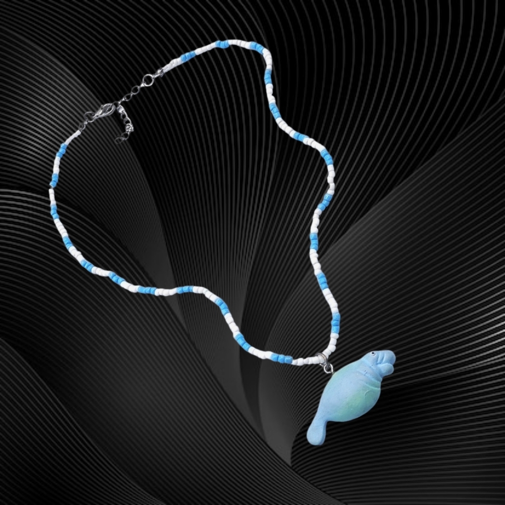 Blue and White Beaded Necklace with Manetee Pendant